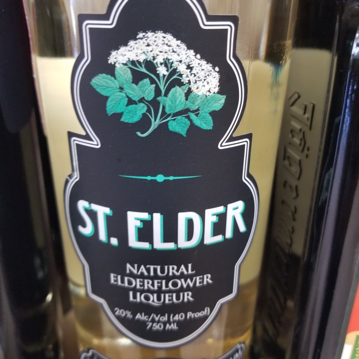 Пару постеров старой рекламы алкоголя. St. Elder Natural Elderflower Liqueur